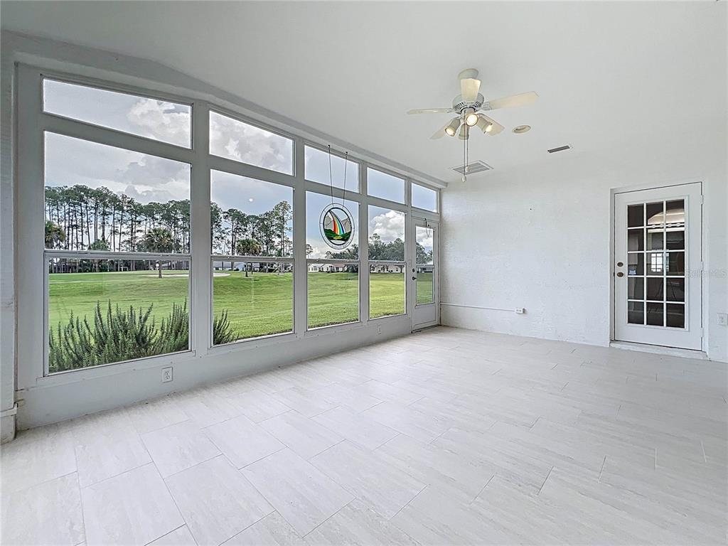 11644 Spindrift Loop Hudson, FL 34667 - Photo 47 of 99 a view of an empty room with a balcony