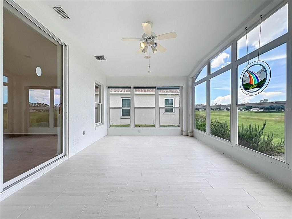 11644 Spindrift Loop Hudson, FL 34667 - Photo 49 of 99 a view of an entryway with a garden
