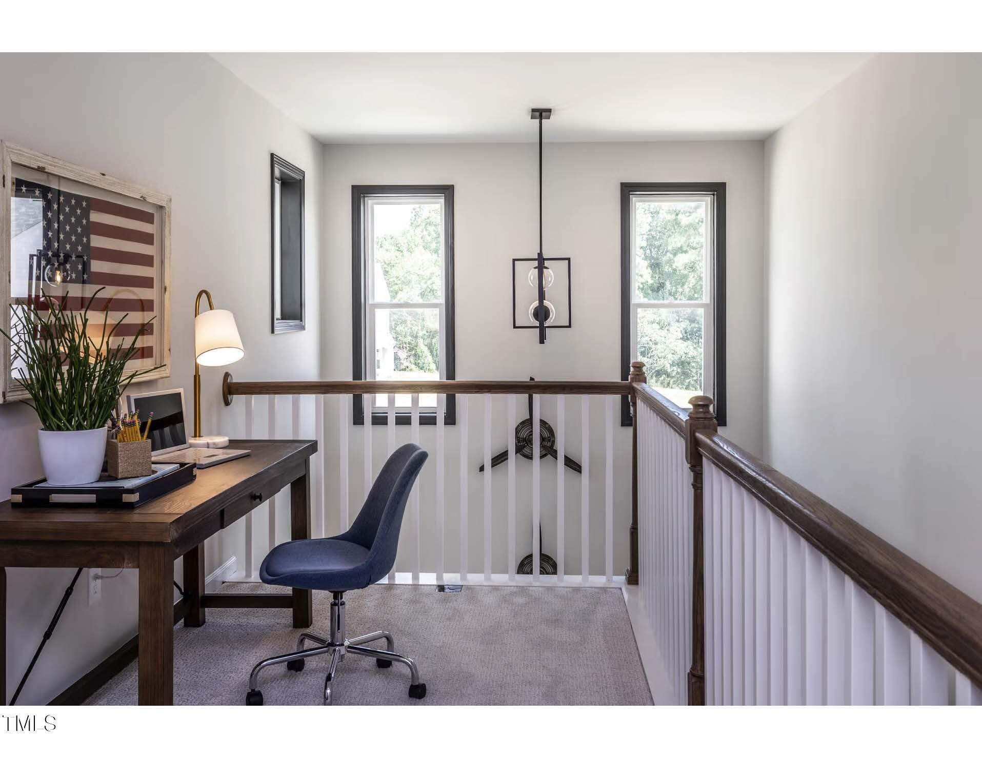 33 White Azalea Way Benson, NC 27504 - Photo 12 of 25 a living room with furniture a window and a potted plants
