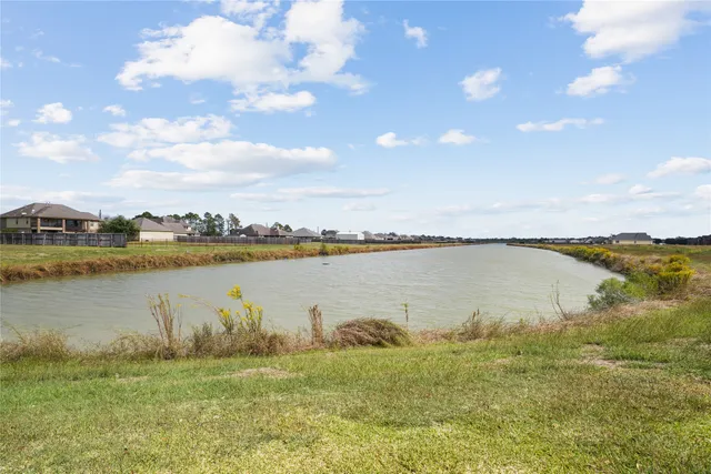 a view of a lake from a yard