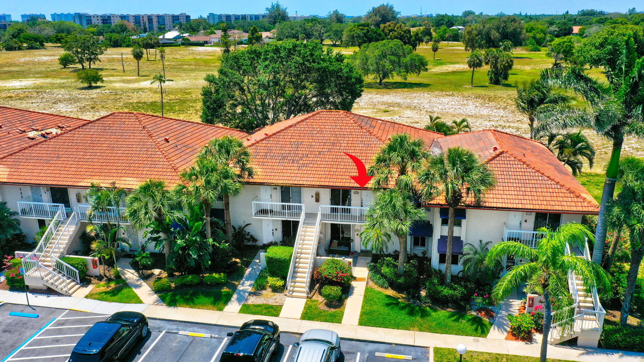 280 Northwest 67th Street, Unit B207 Boca Raton, FL 33487 - Photo 22 of 22 an aerial view of a house with garden space and lake view
