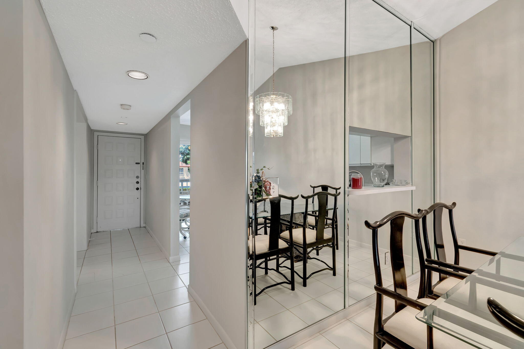280 Northwest 67th Street, Unit B207 Boca Raton, FL 33487 - Photo 10 of 22 a view of a dining room with furniture