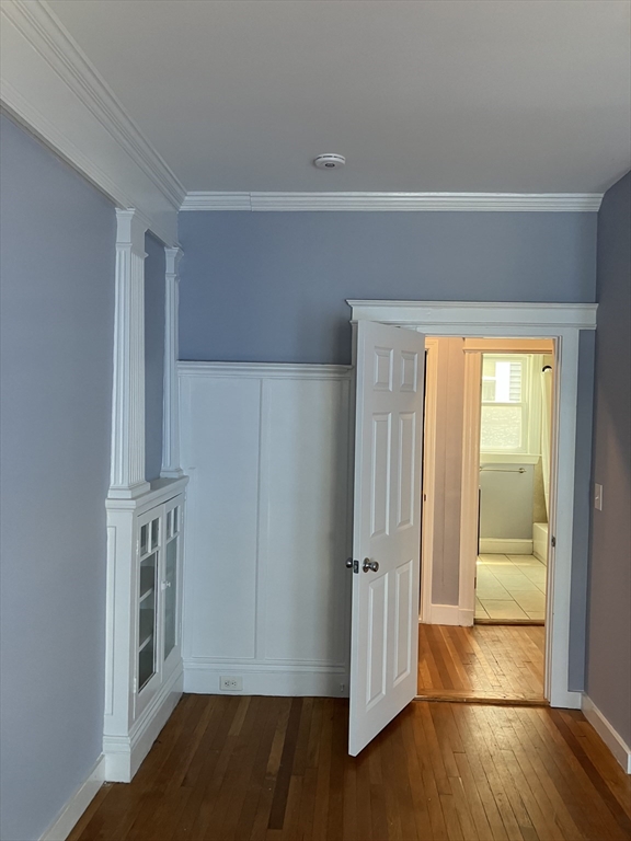 29 Cottage Street Chelsea, MA 02150 - Photo 20 of 24 a view of empty room with wooden floor