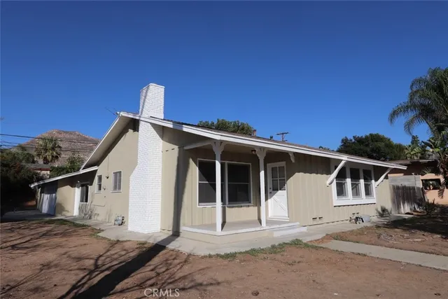 a view of a house with a patio