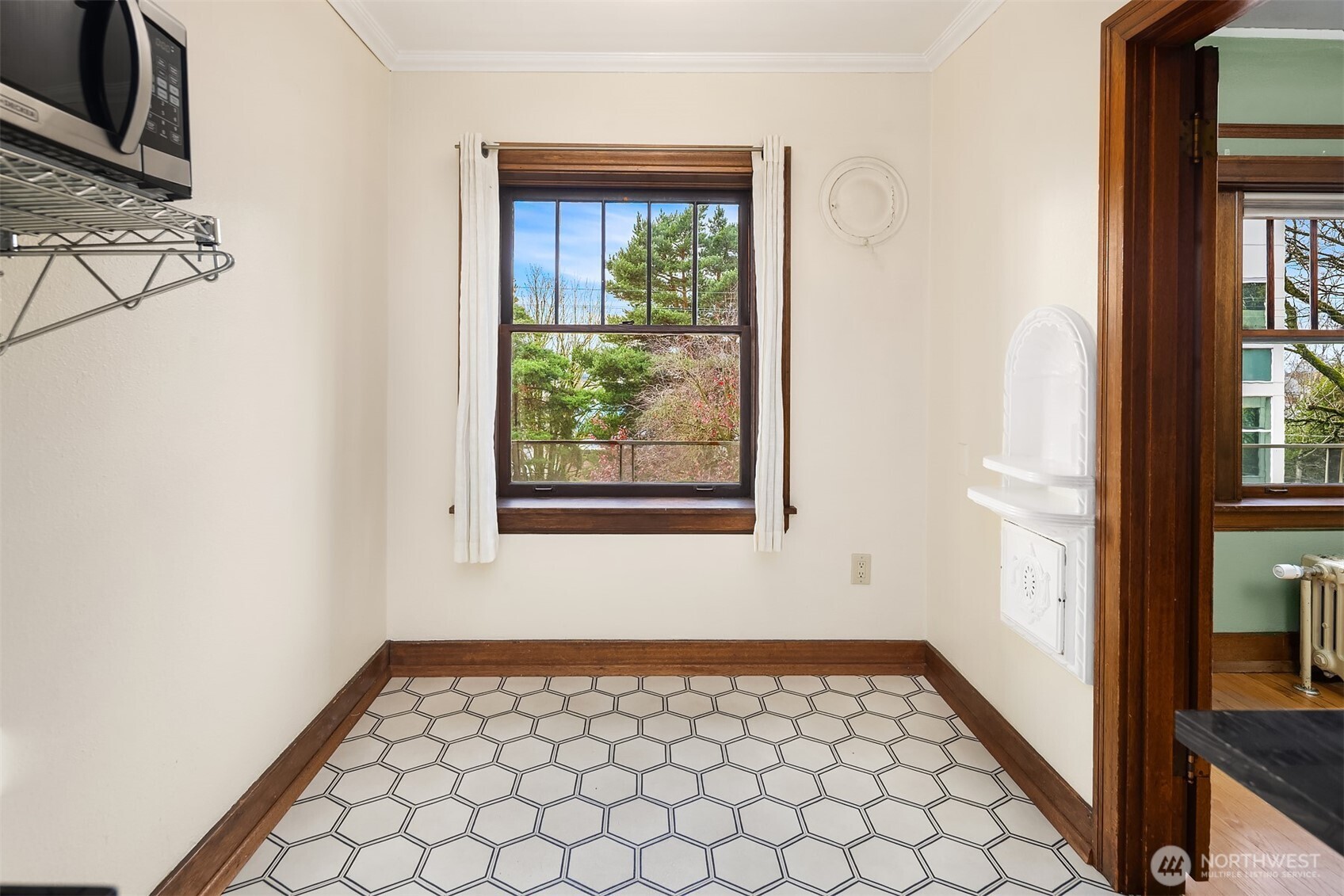 1631 16th Avenue, Unit 309 Seattle, WA 98122 - Photo 13 of 23 a view of a room with window