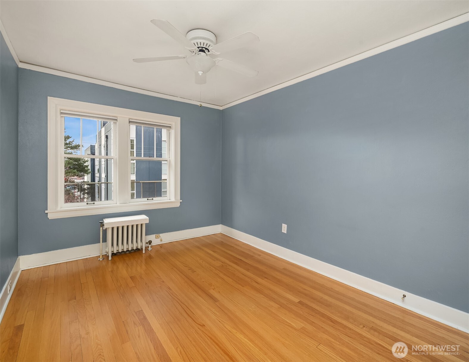 1631 16th Avenue, Unit 309 Seattle, WA 98122 - Photo 15 of 23 a view of an empty room with a window
