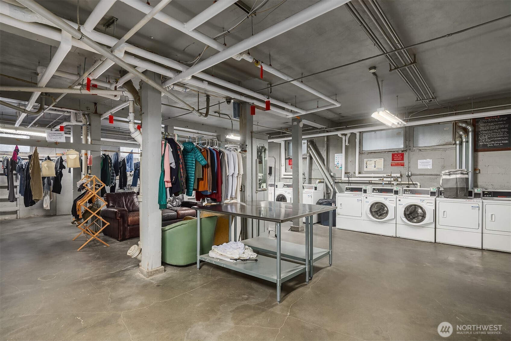 1631 16th Avenue, Unit 309 Seattle, WA 98122 - Photo 23 of 23 a view of a garage with white wooden building