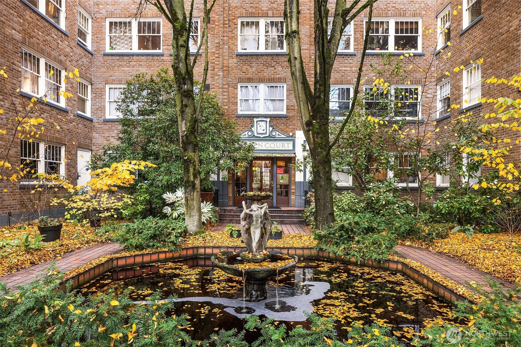 1631 16th Avenue, Unit 309 Seattle, WA 98122 - Photo 3 of 23 a view of a chairs and table in a patio