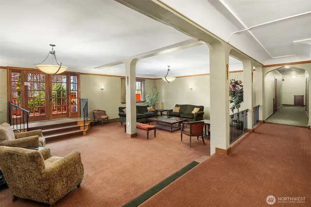 a living room with furniture and a table