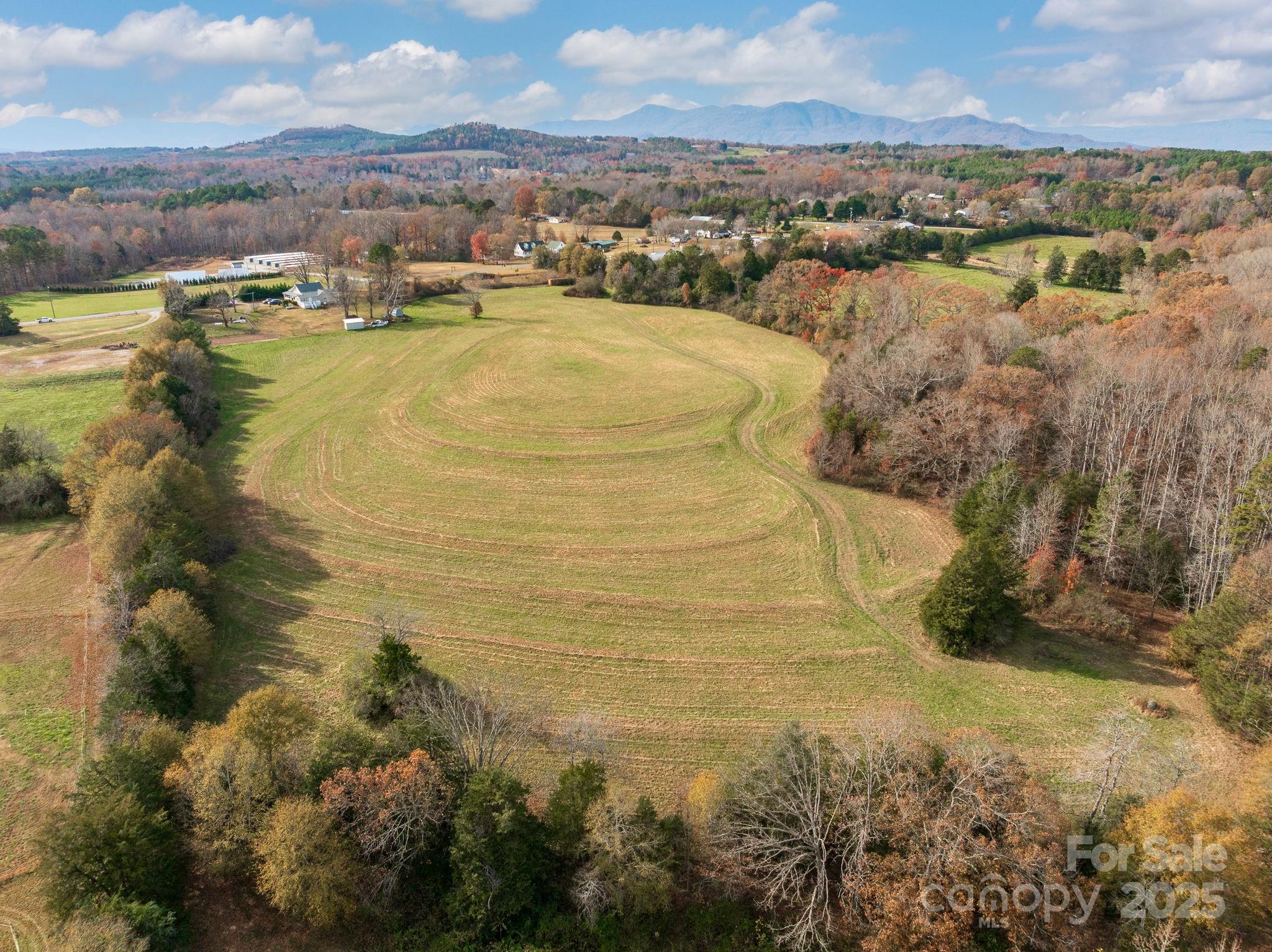 6505 Highway 9 Columbus, NC 28722 - Photo 19 of 21 a view of a lake with mountains in the background