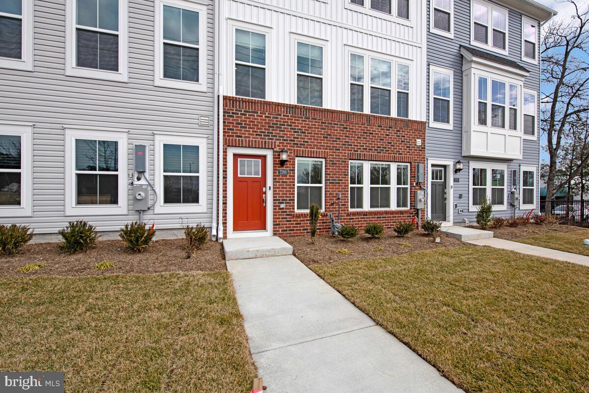 7268 Contee Road Laurel, MD 20707 - Photo 2 of 42 a front view of a house with swimming pool