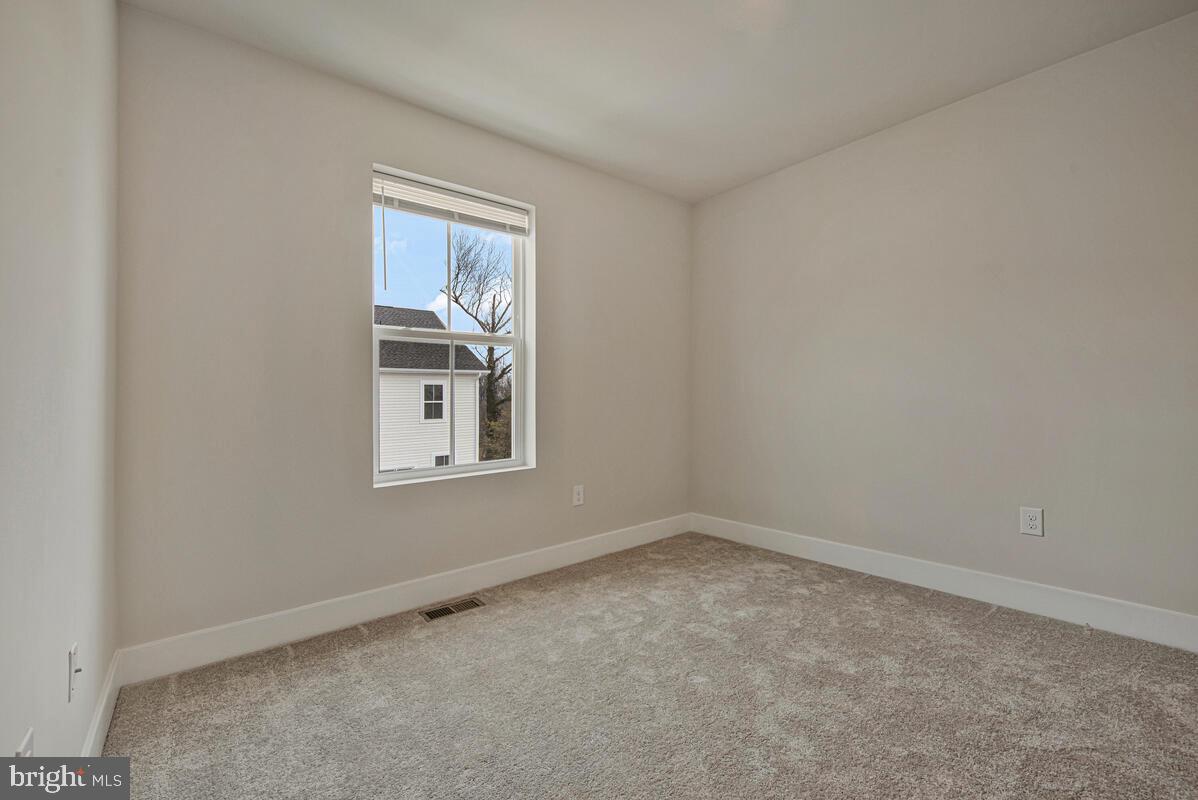 7268 Contee Road Laurel, MD 20707 - Photo 28 of 42 an empty room with windows