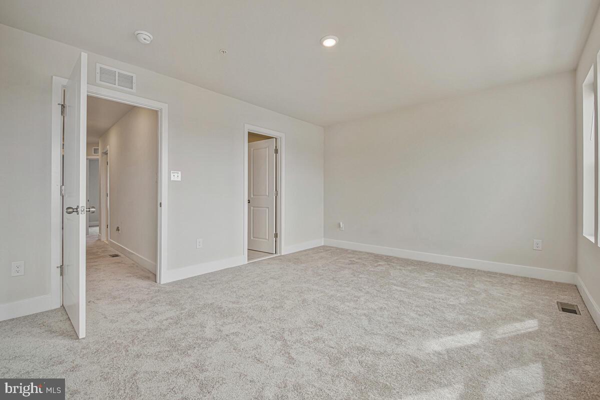 7268 Contee Road Laurel, MD 20707 - Photo 33 of 42 an empty room with an entryway