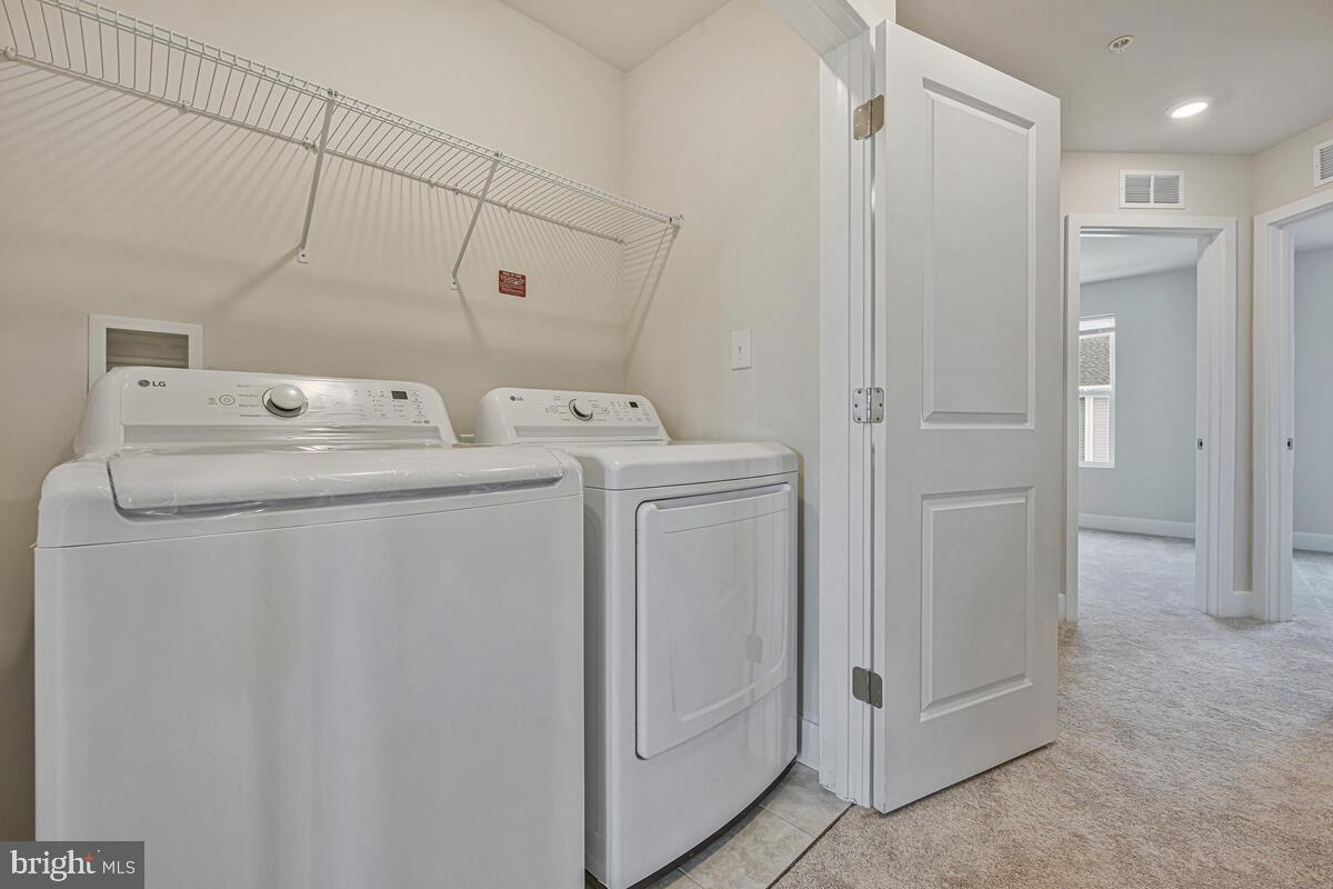 7268 Contee Road Laurel, MD 20707 - Photo 37 of 42 a utility room with dryer and washer