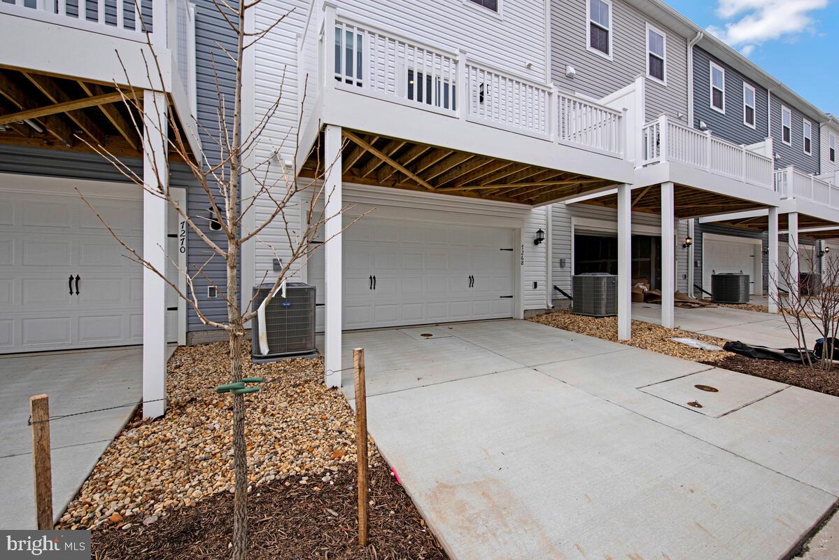 7268 Contee Road Laurel, MD 20707 - Photo 42 of 42 a view of a house with a door and wooden walls