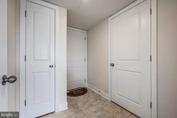 a view of a room with a wardrobe space