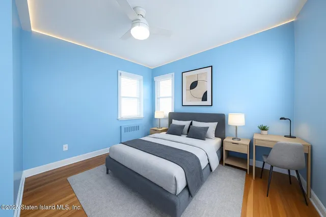 an aerial view of residential houses with outdoor space and swimming pool