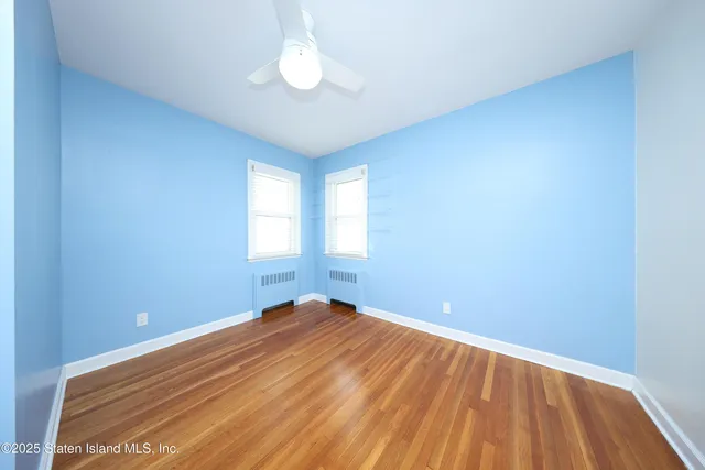 a view of houses with a street