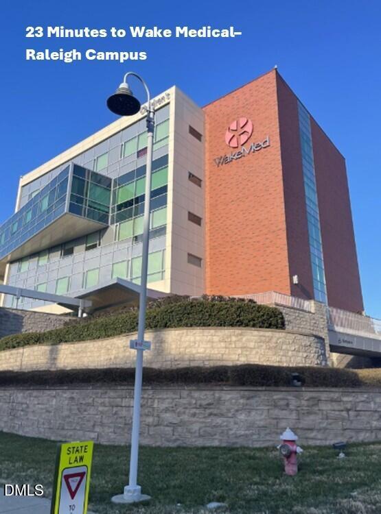 322 Short Ridge Way Rolesville, NC 27571 - Photo 22 of 22 a front view of a house with a yard