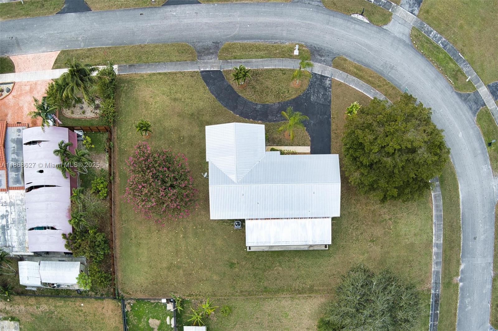 27661 Southwest 162nd Court Homestead, FL 33031 - Photo 52 of 60 an aerial view of a house with garden space