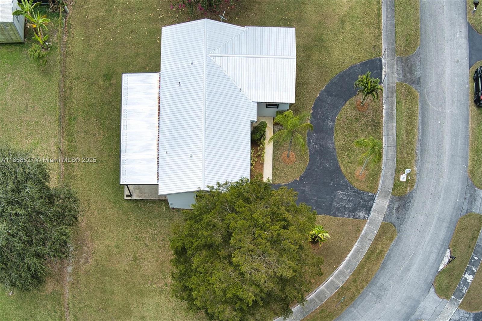 27661 Southwest 162nd Court Homestead, FL 33031 - Photo 53 of 60 an aerial view of a residential houses with outdoor space