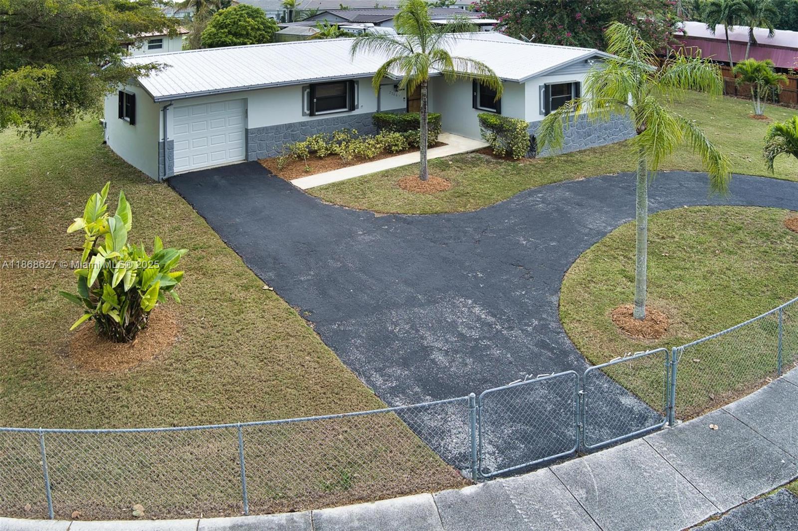 27661 Southwest 162nd Court Homestead, FL 33031 - Photo 57 of 60 a view of a house with a swimming pool