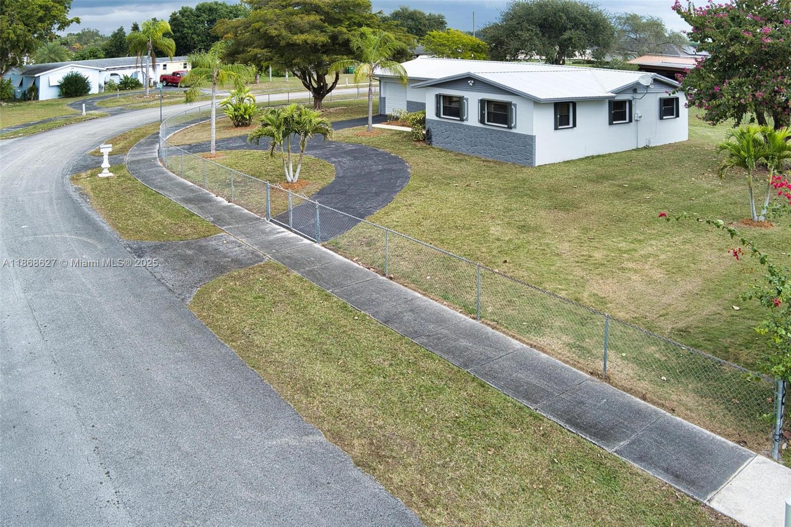 27661 Southwest 162nd Court Homestead, FL 33031 - Photo 59 of 60 a swimming pool view with a outdoor seating