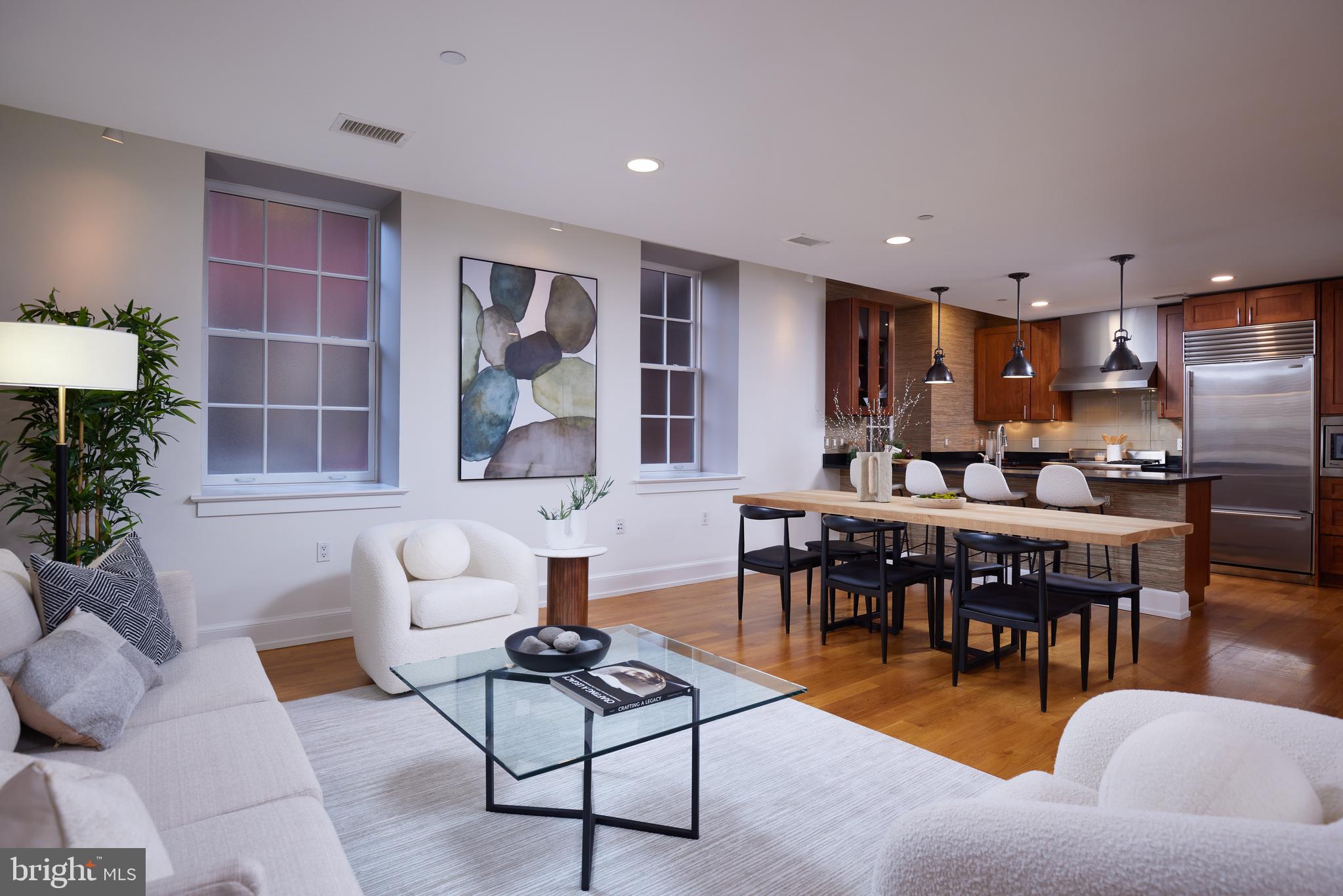 215 I Street Northeast, Unit 1B Washington, DC 20002 - Photo 14 of 78 Open living and dining connected to the kitchen