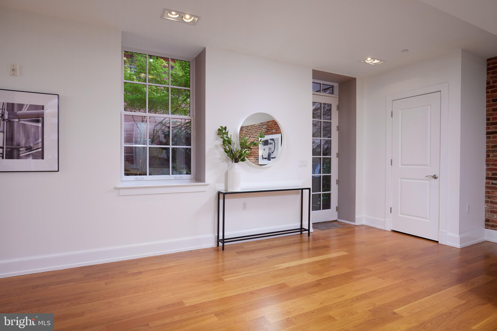 215 I Street Northeast, Unit 1B Washington, DC 20002 - Photo 27 of 78 View from the kitchen to the front door