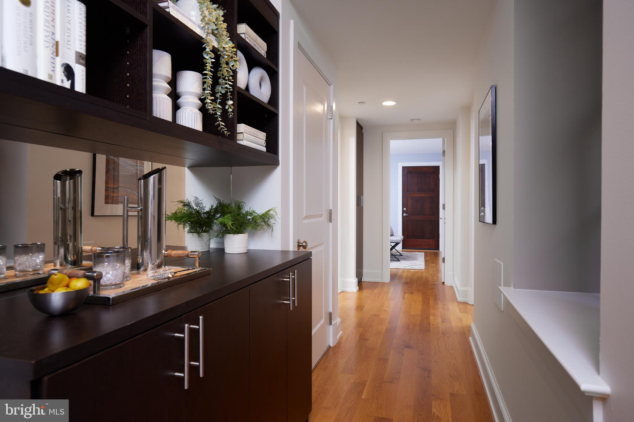 215 I Street Northeast, Unit 1B Washington, DC 20002 - Photo 29 of 78 Custom built-ins for extra storage and a bar