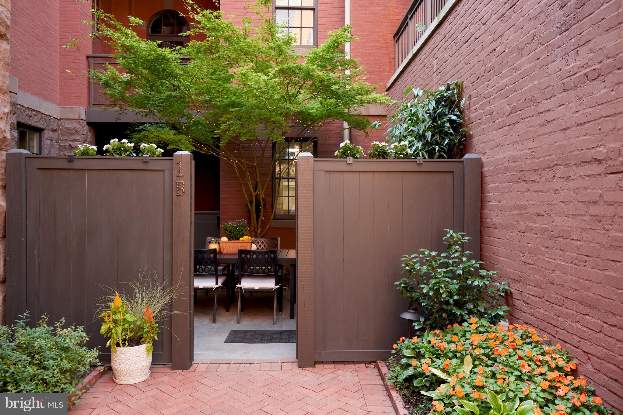 215 I Street Northeast, Unit 1B Washington, DC 20002 - Photo 3 of 78 Patio entrance to the property