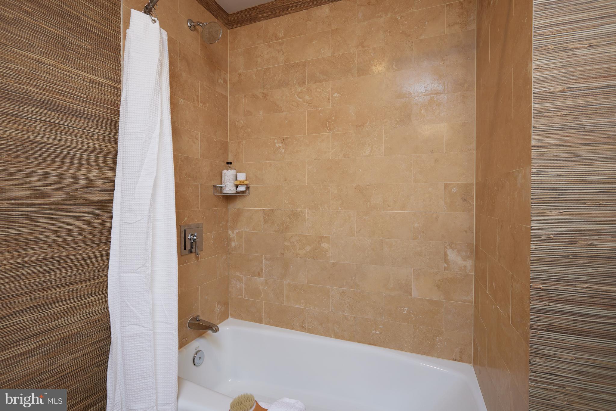 215 I Street Northeast, Unit 1B Washington, DC 20002 - Photo 44 of 78 Shower and tub combo in the second bathroom