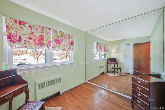 a room with furniture and a window