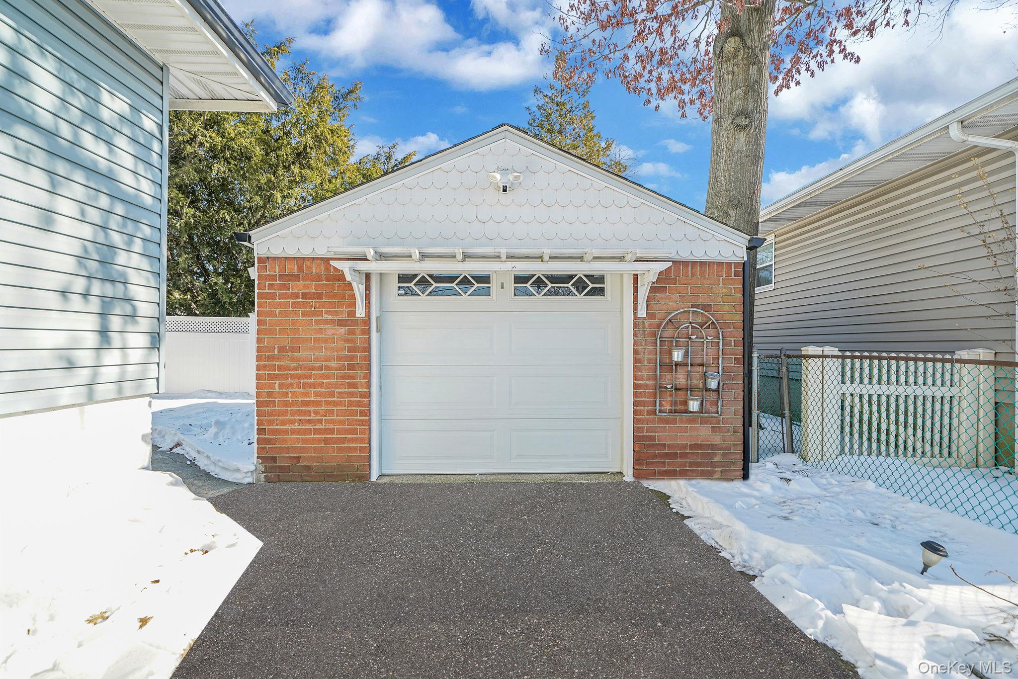 2009 Newbridge Road Bellmore, NY 11710 - Photo 4 of 24 a front view of a house