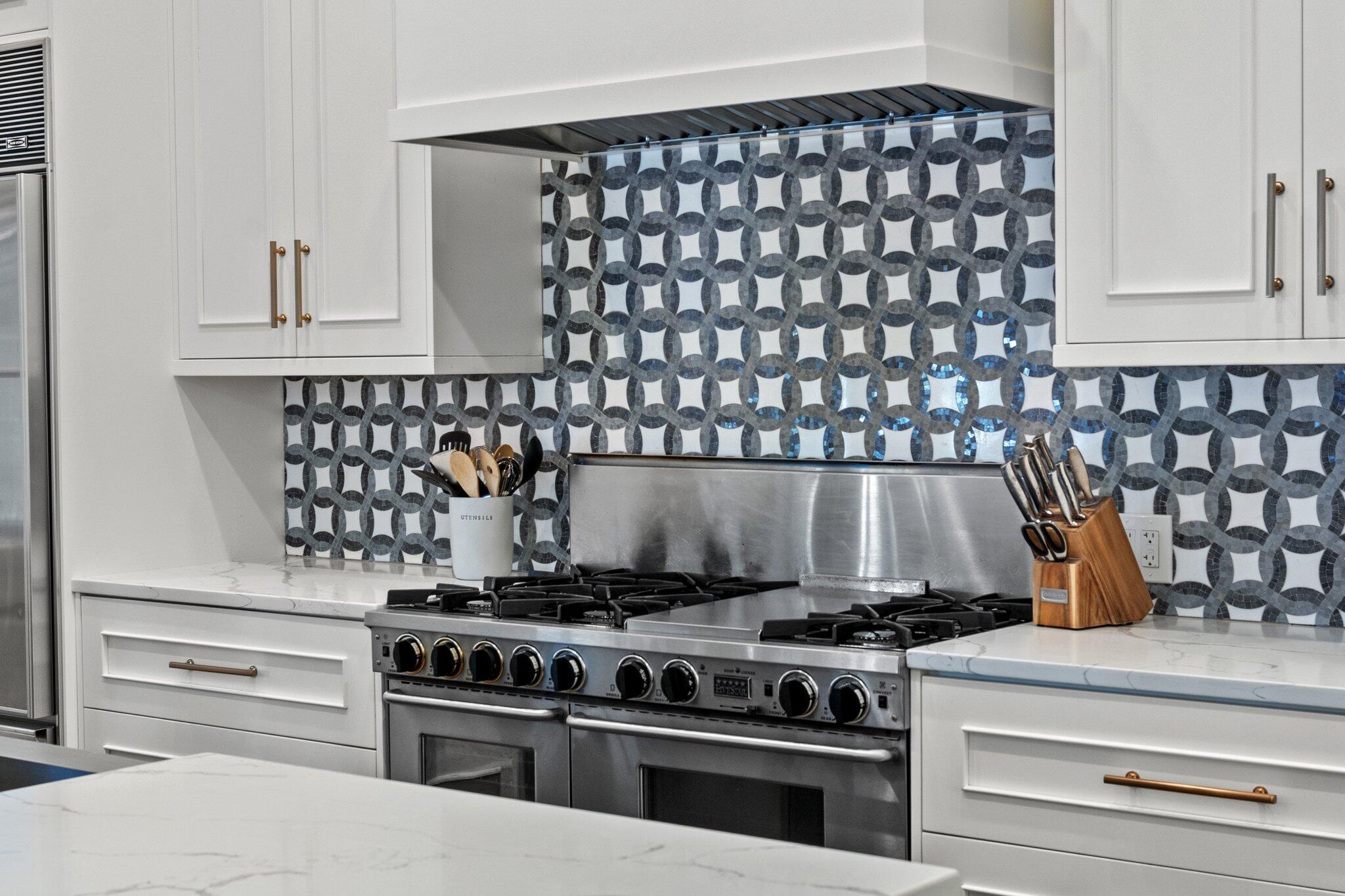 101 Round Road Rosemary Beach, FL 32461 - Photo 12 of 46 a stove top oven sitting inside of a kitchen