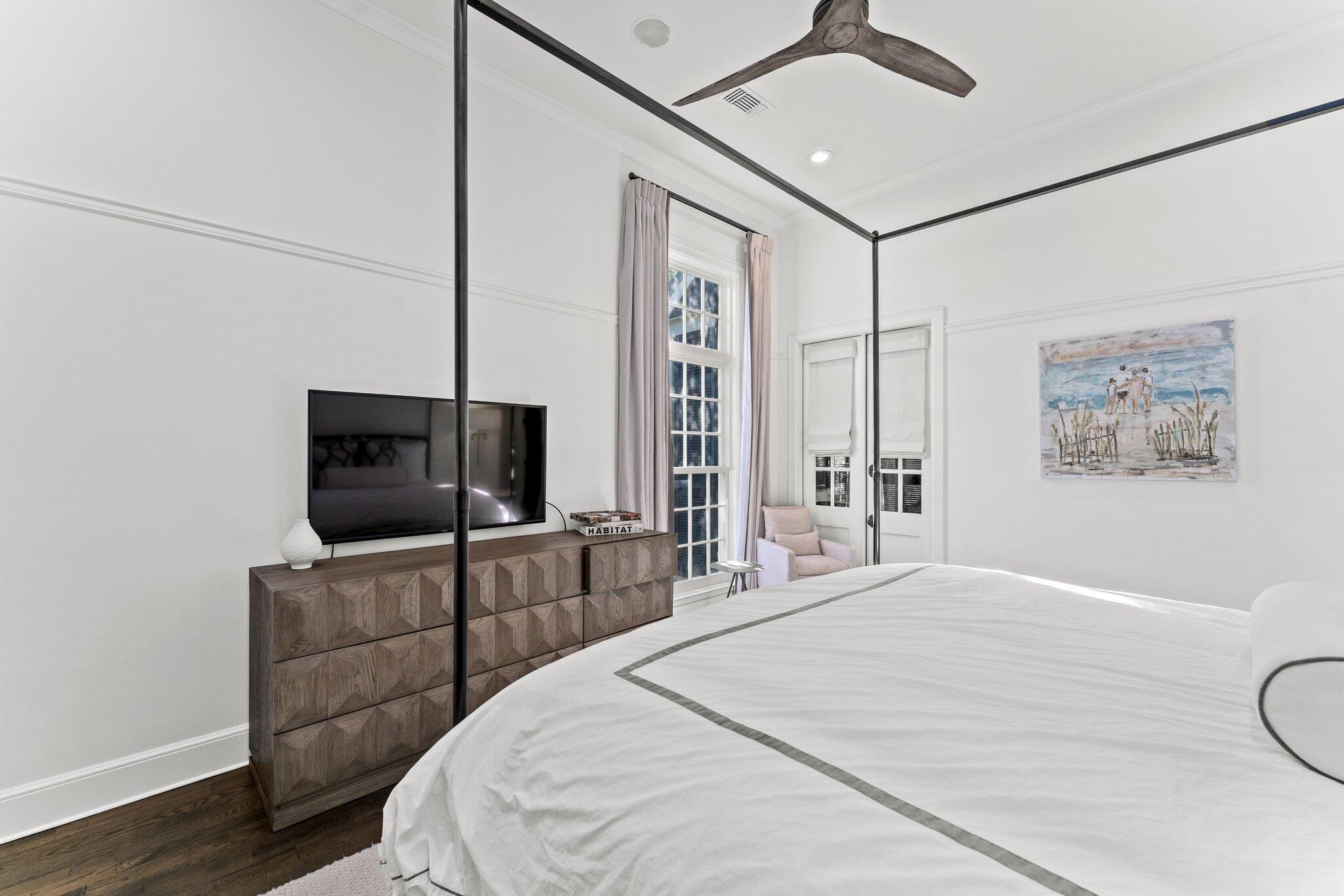 101 Round Road Rosemary Beach, FL 32461 - Photo 14 of 46 a bedroom with a bed and a flat screen tv