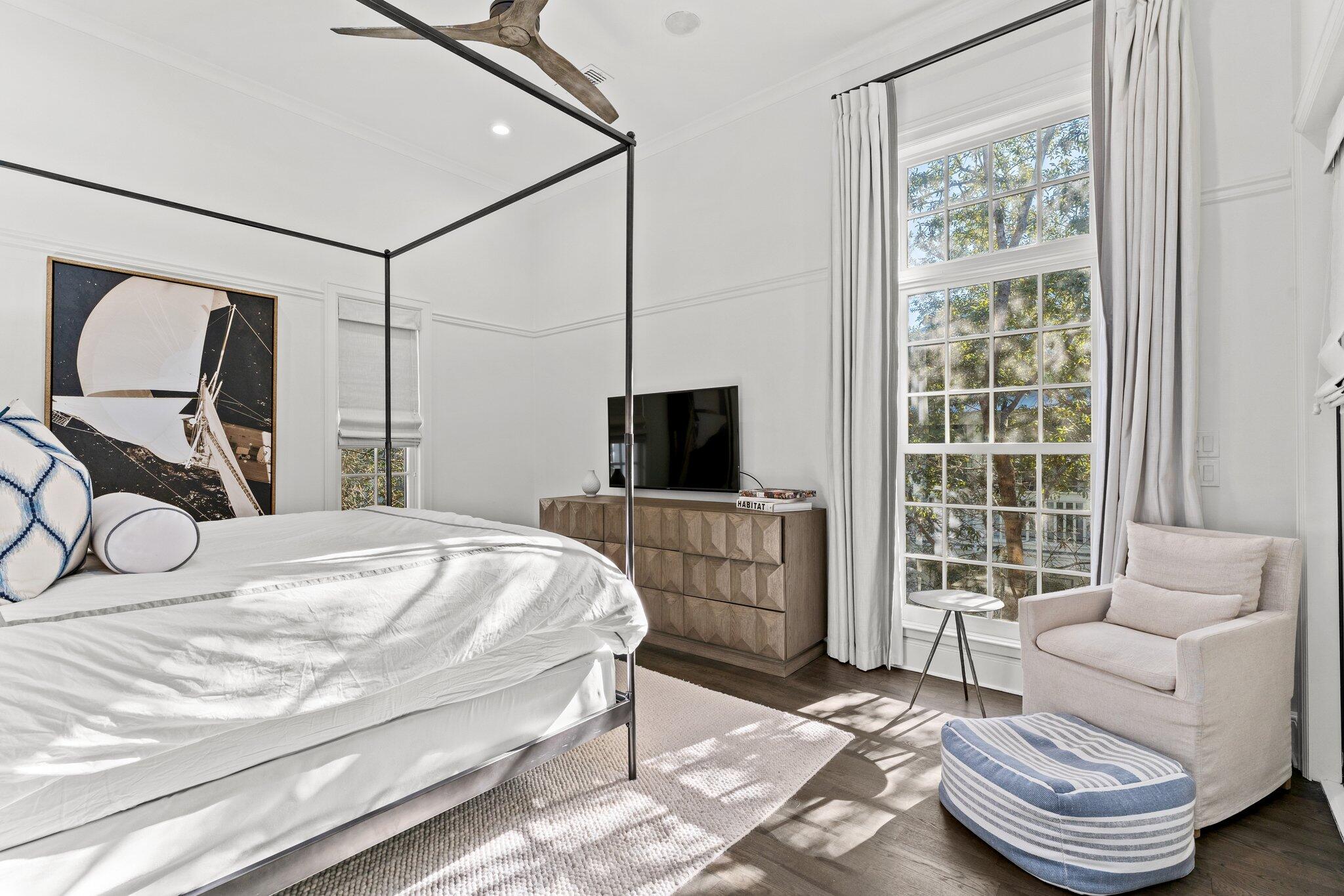 101 Round Road Rosemary Beach, FL 32461 - Photo 15 of 46 a bedroom with a bed and a television