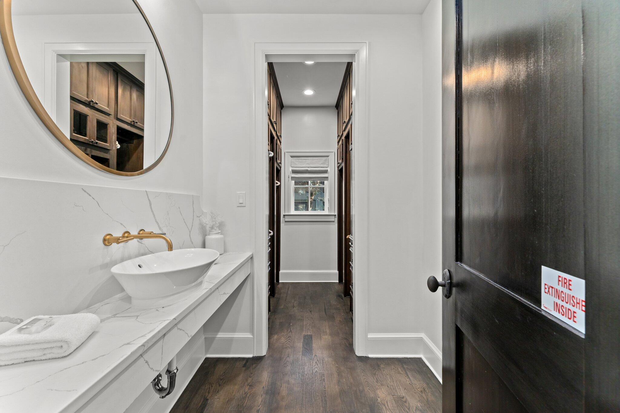 101 Round Road Rosemary Beach, FL 32461 - Photo 17 of 46 a bathroom with a sink and a mirror