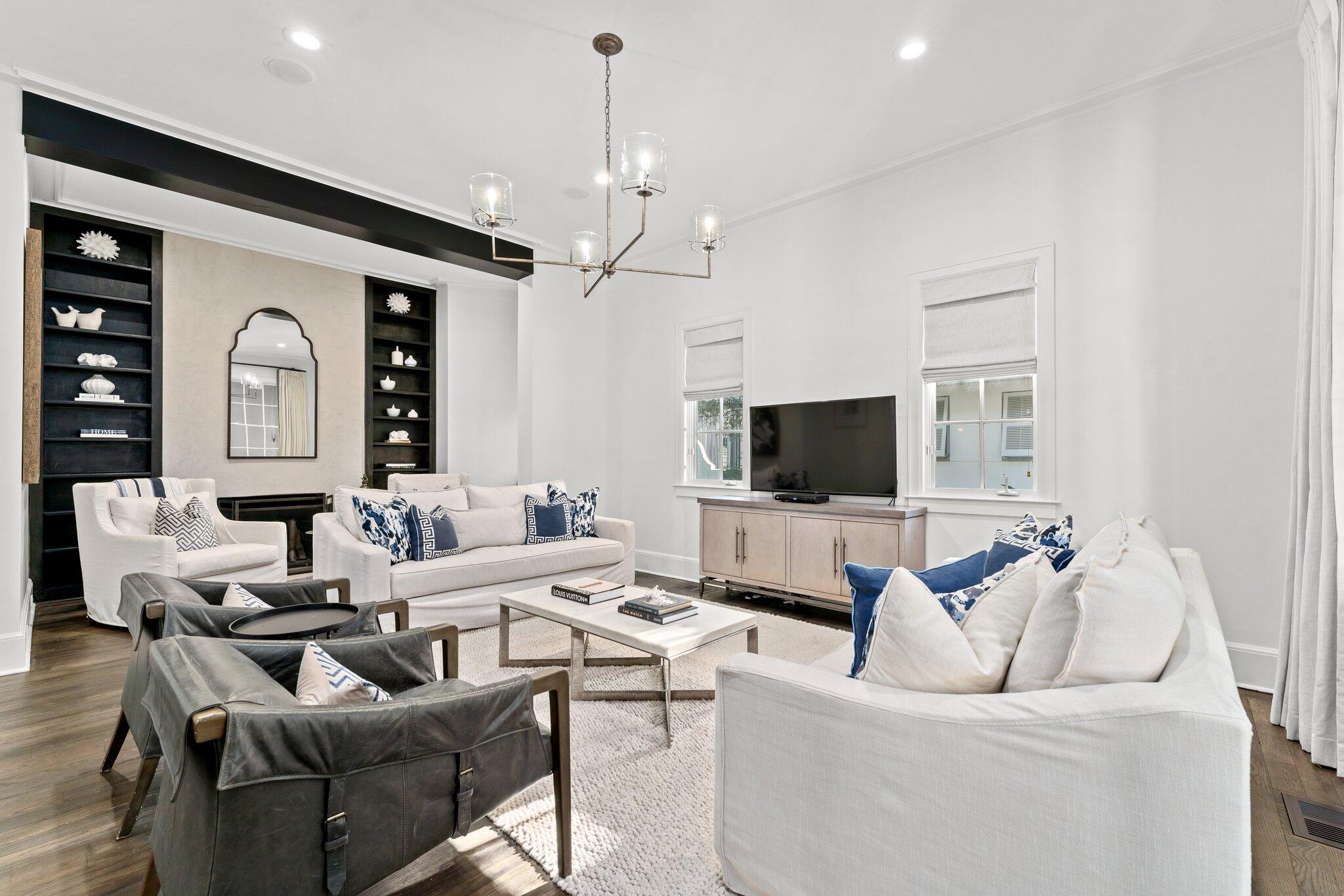 101 Round Road Rosemary Beach, FL 32461 - Photo 2 of 46 a living room with furniture and a flat screen tv
