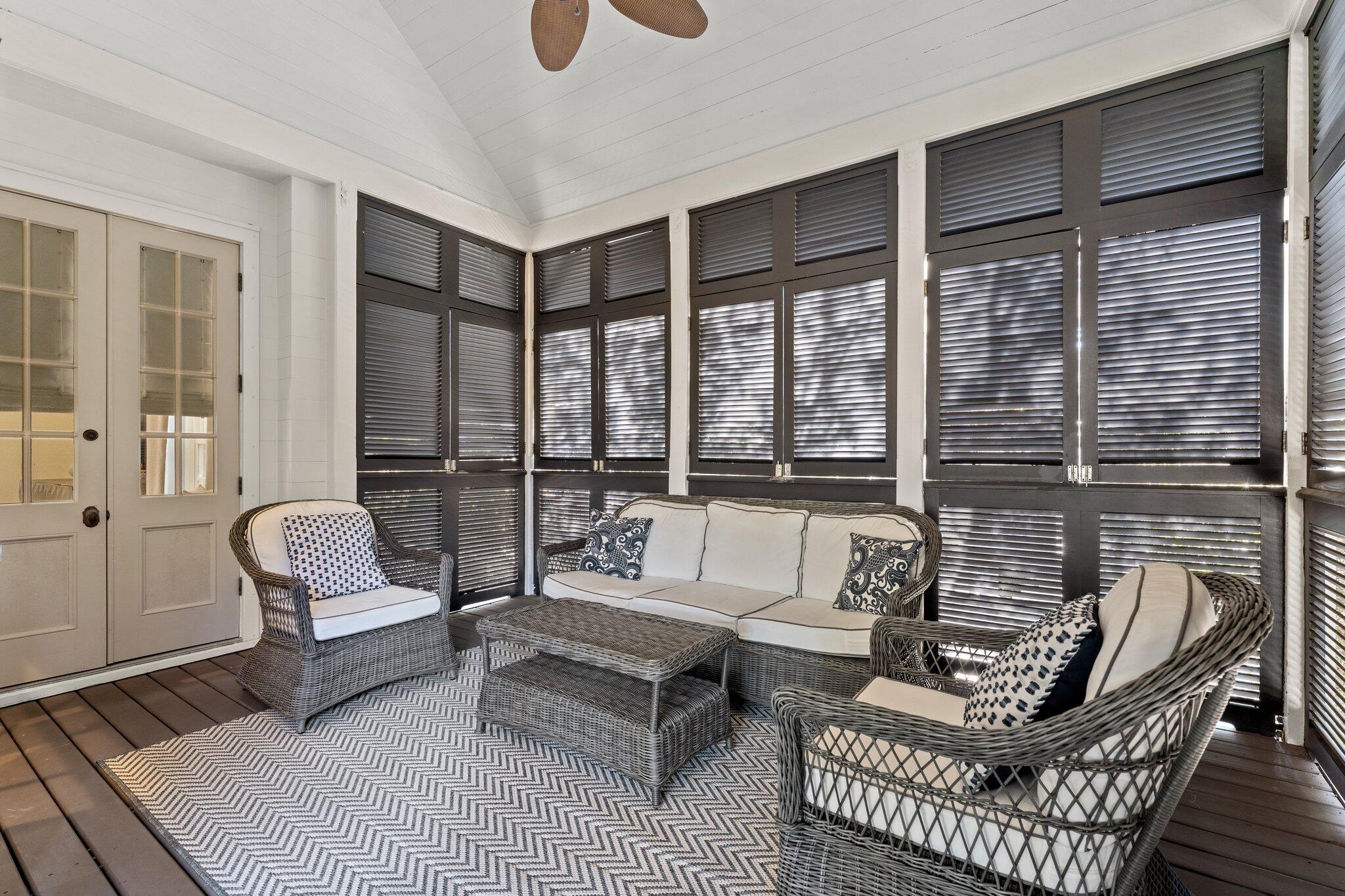 101 Round Road Rosemary Beach, FL 32461 - Photo 22 of 46 a living room with furniture and a large window