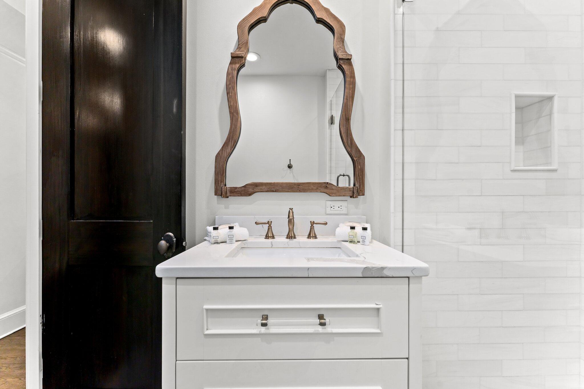 101 Round Road Rosemary Beach, FL 32461 - Photo 25 of 46 a bathroom with a sink and a mirror