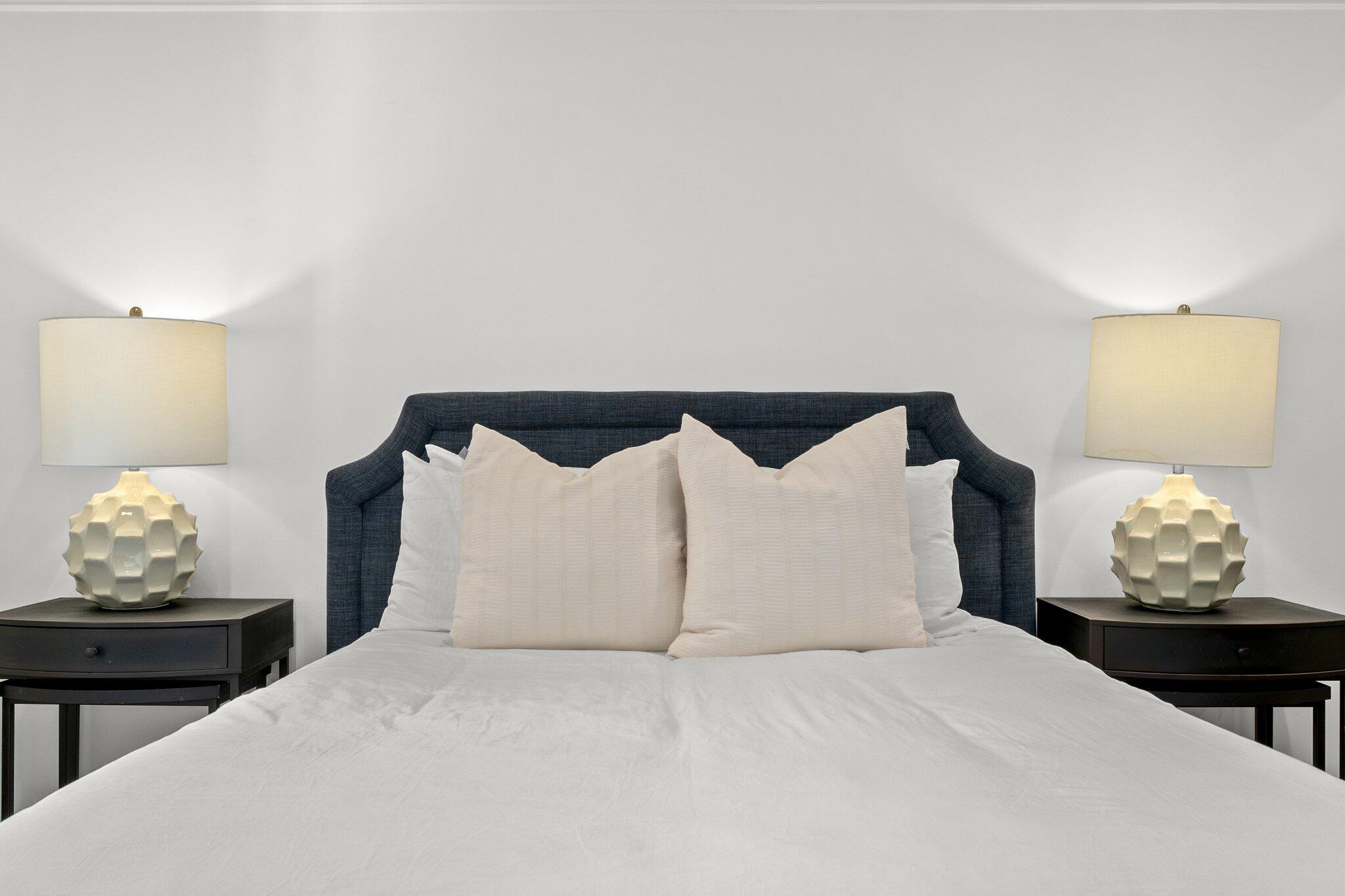 101 Round Road Rosemary Beach, FL 32461 - Photo 26 of 46 a large bed sitting in a bedroom and dresser