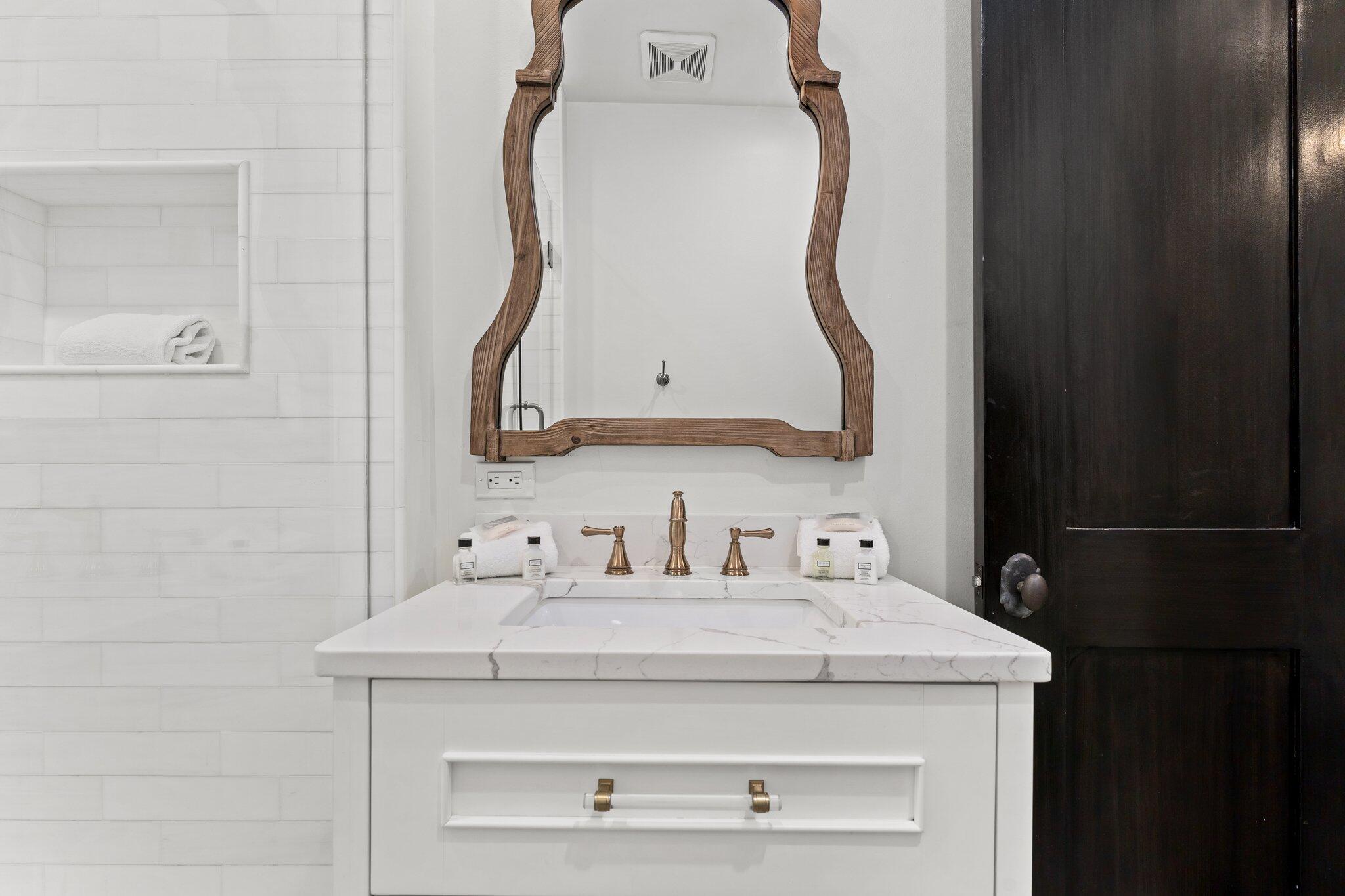 101 Round Road Rosemary Beach, FL 32461 - Photo 29 of 46 a bathroom with a sink vanity and a mirror