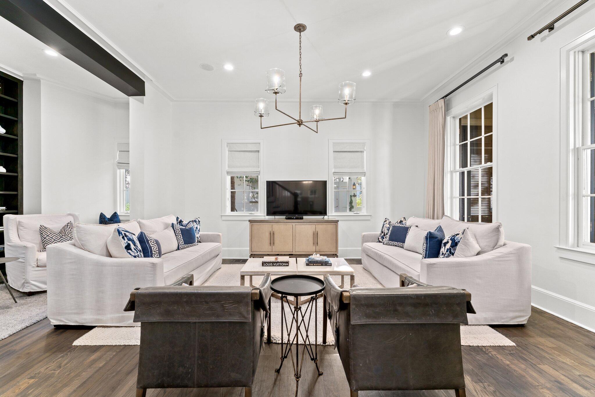 101 Round Road Rosemary Beach, FL 32461 - Photo 4 of 46 a living room with furniture and a flat screen tv