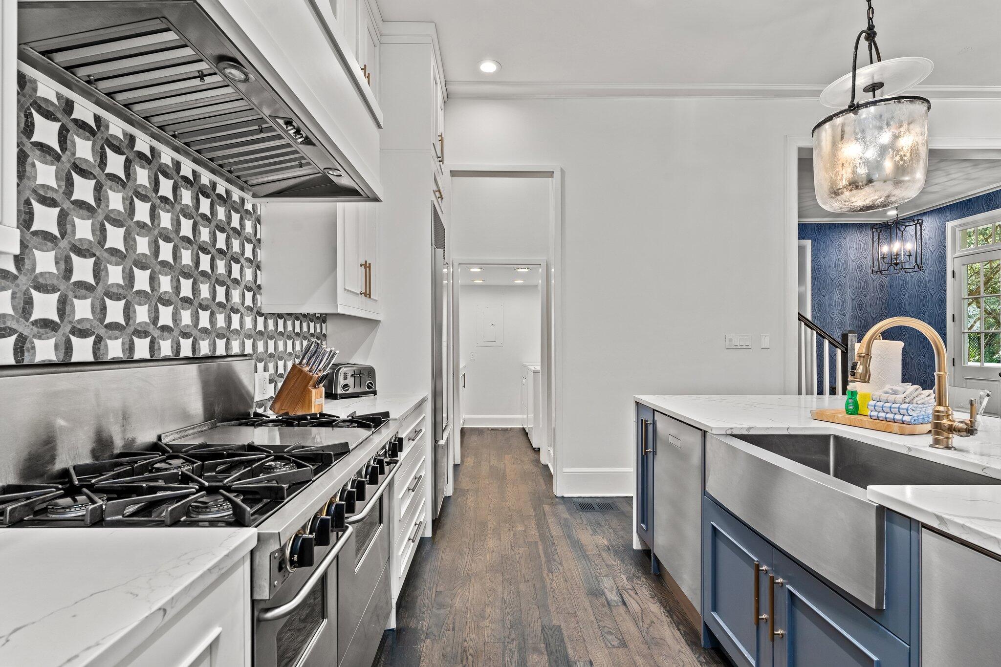 101 Round Road Rosemary Beach, FL 32461 - Photo 9 of 46 a kitchen with a stove and a sink