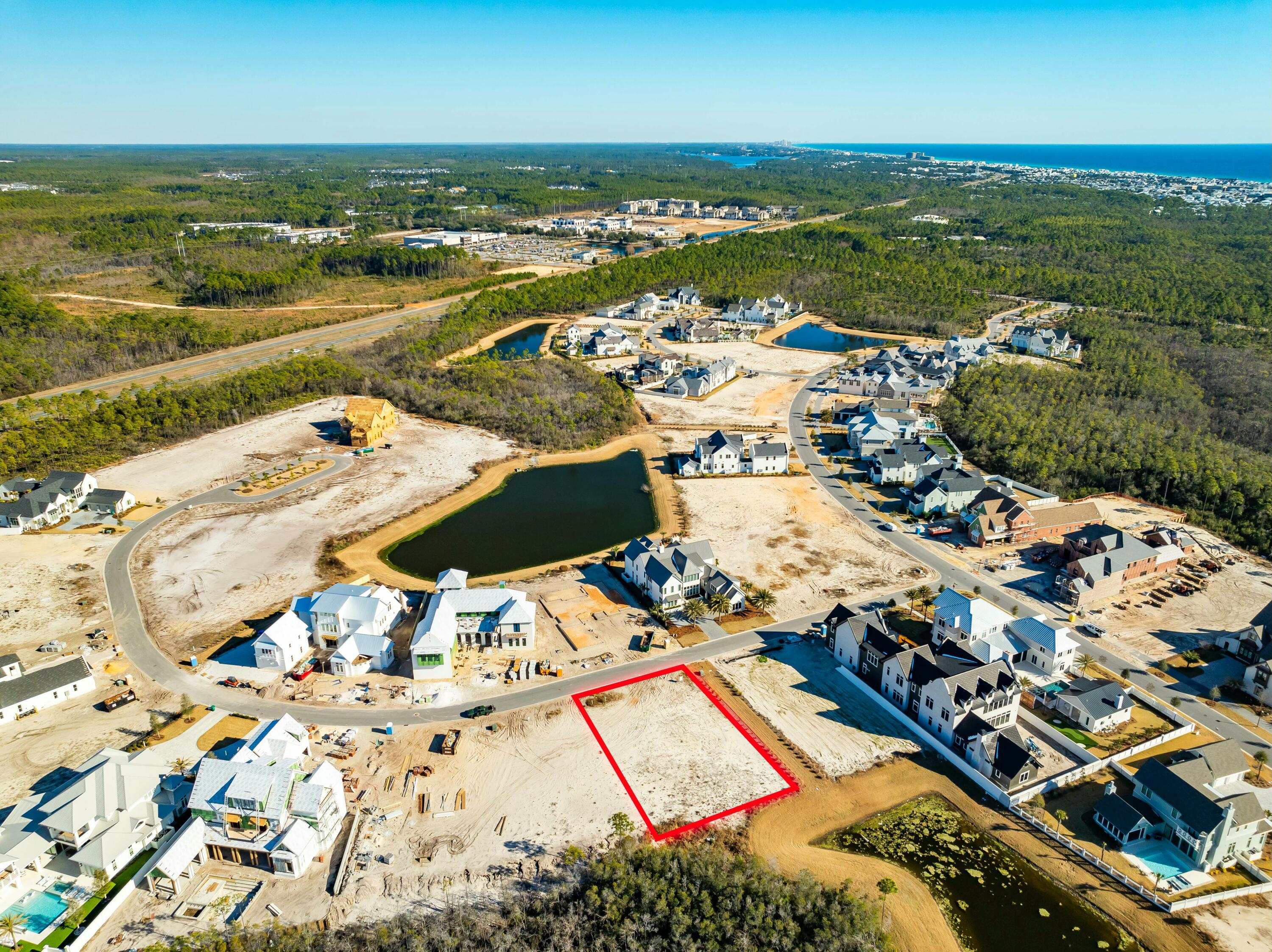 Lot 217 Quail Hollow Inlet Beach, FL 32461 - Photo 11 of 26 an aerial view of a city with ocean view