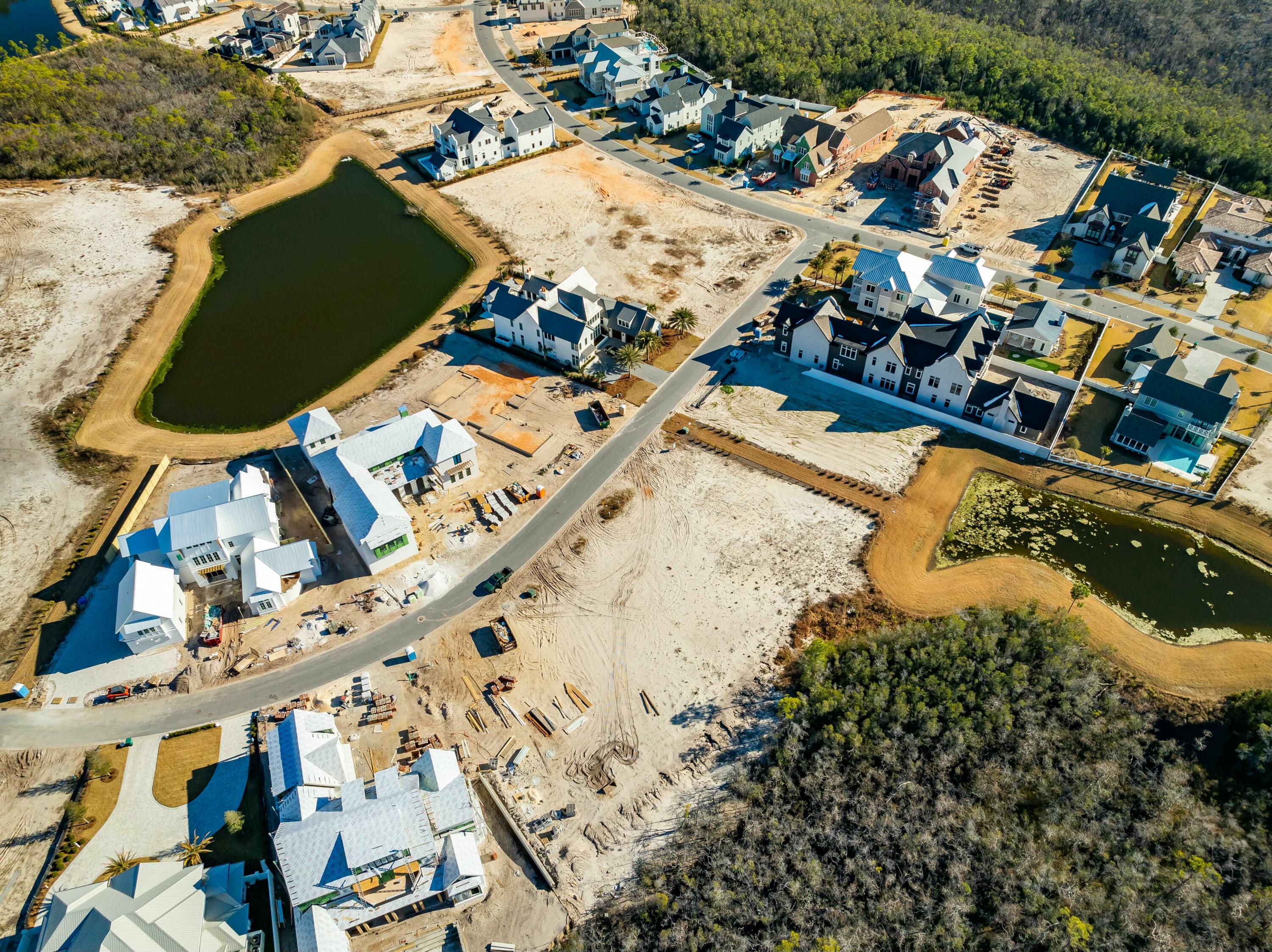 Lot 217 Quail Hollow Inlet Beach, FL 32461 - Photo 13 of 26 an aerial view of a house with a lake