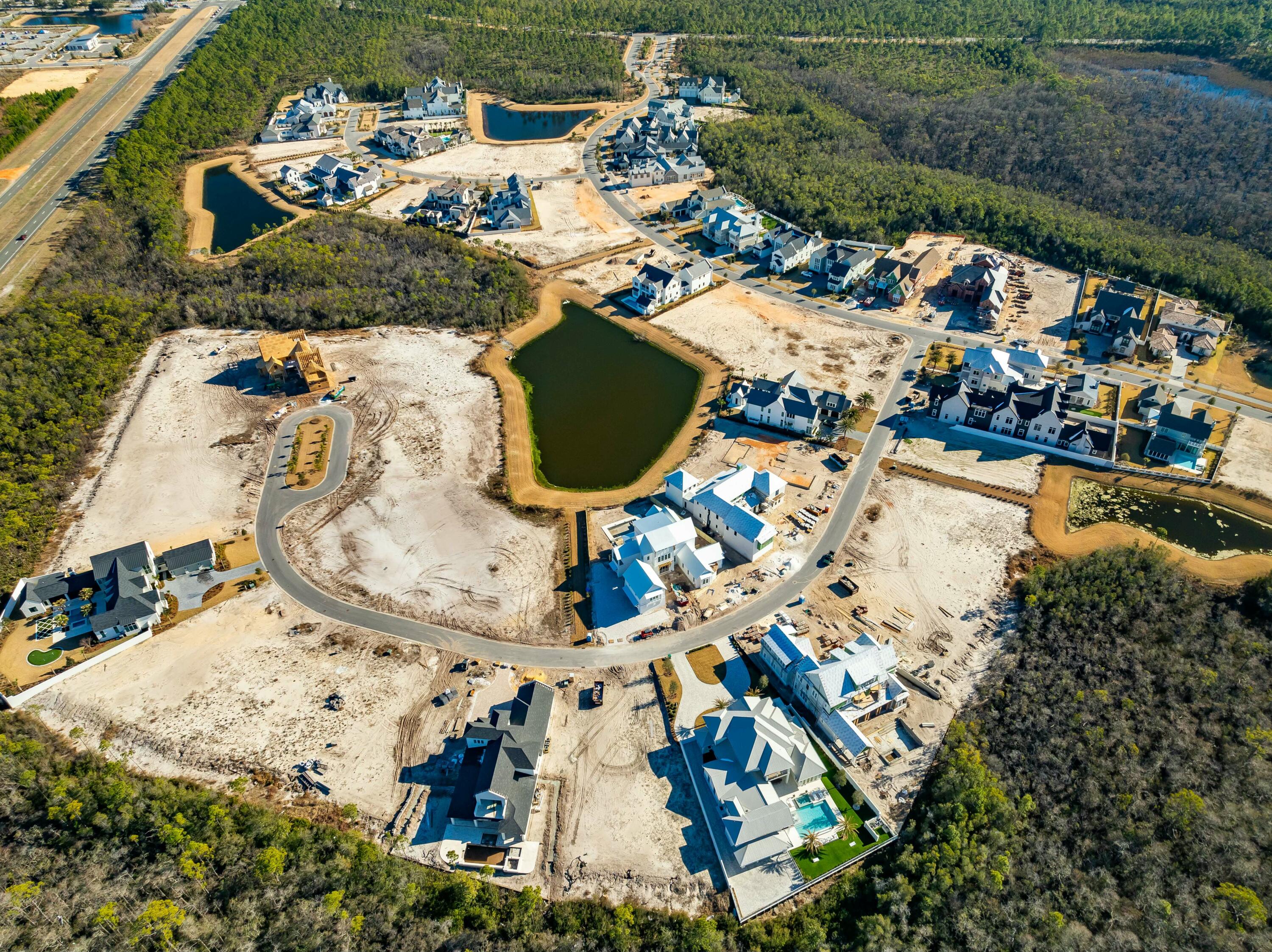 Lot 217 Quail Hollow Inlet Beach, FL 32461 - Photo 21 of 26 an aerial view of a house with a swimming pool