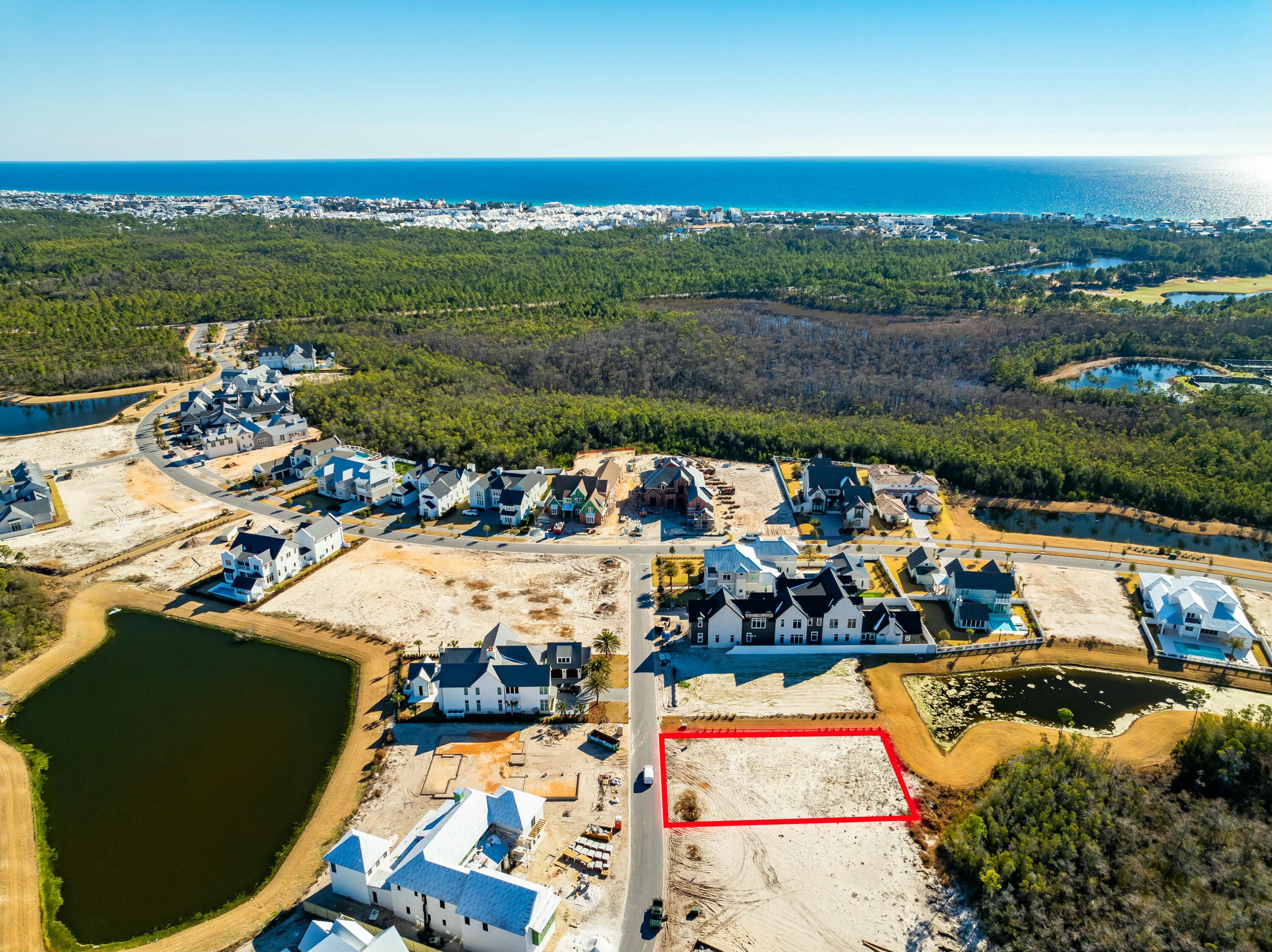 Lot 217 Quail Hollow Inlet Beach, FL 32461 - Photo 8 of 26 an aerial view of a house with a ocean view