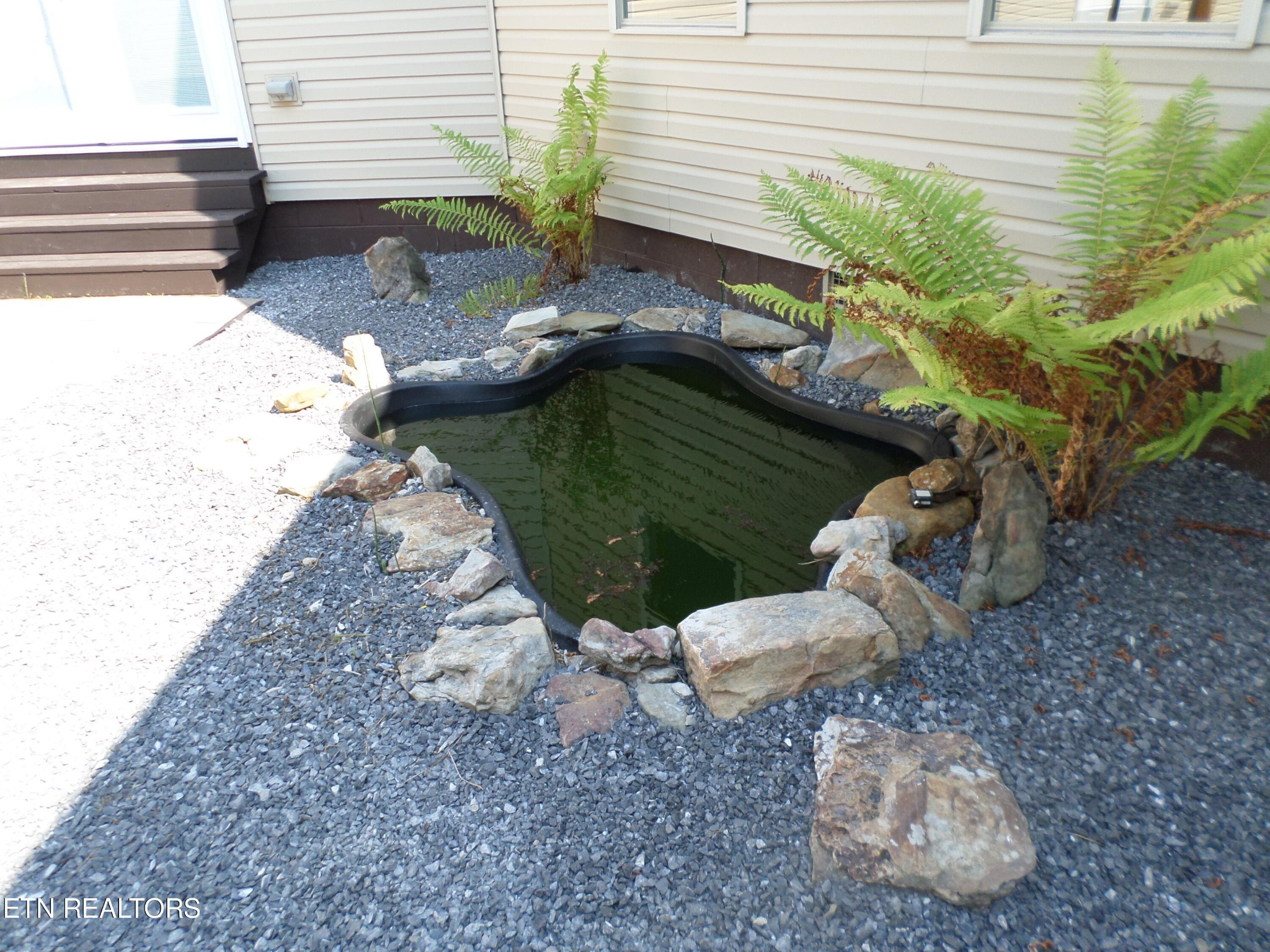 236 Woods Road Oliver Springs, TN 37840 - Photo 18 of 23 a view of a backyard of the house